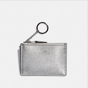 A COACH mini ID/License holder